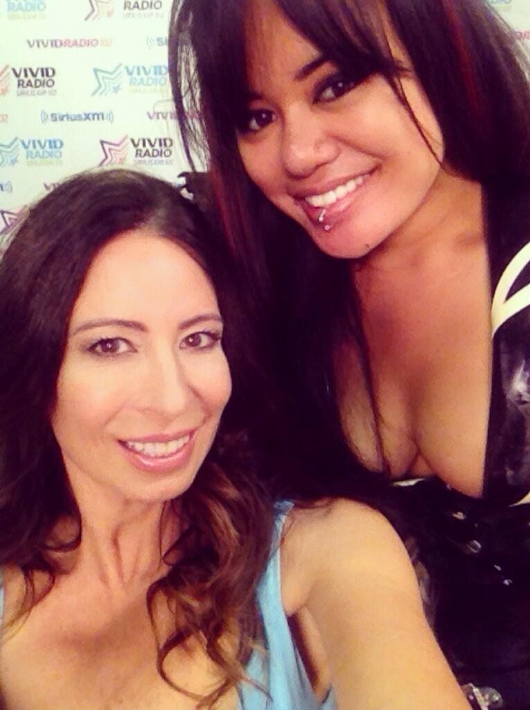 With fellow Vivid radio host and porn legend Christy Canyon.